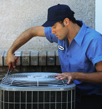 technician-servicing-ac-unit