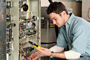 service-technician-tests-furnace-safely